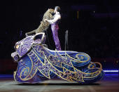 <p>Big-cat trainer Alexander Lacey performs with a leopard, May 1, 2016, in Providence, R.I. (AP Photo/Bill Sikes) </p>