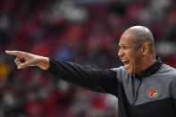 Louisville head coach Kenny Payne shouts instructions to his team during the first half of an NCAA college basketball game against Georgia Tech in Louisville, Ky., Wednesday, Feb. 1, 2023. (AP Photo/Timothy D. Easley)