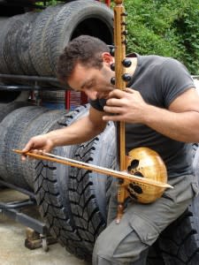 Mechanic playing musical instrument