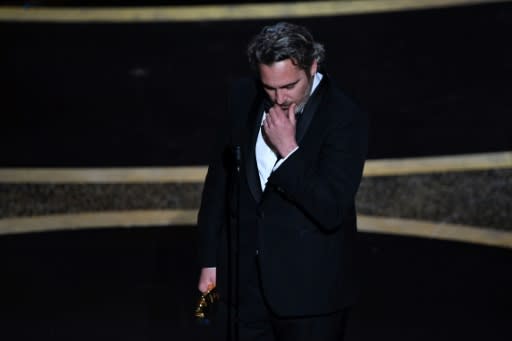 Joaquin Phoenix got emotional as he accepted the best actor Oscar for "Joker"