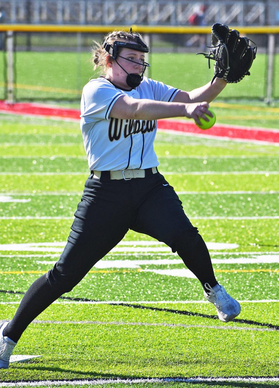 Western Wayne's Trinity Graboske deals to the dish during Lackawanna League softball action against longtime rival Honesdale.