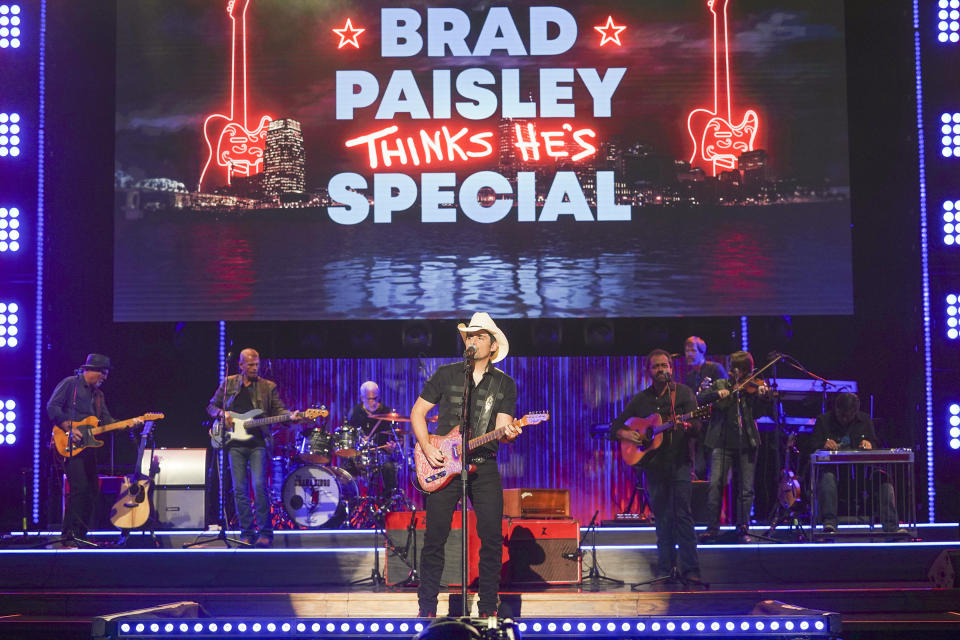 This image released by ABC shows Brad Paisley during a taping of his variety special "Brad Paisley Thinks He's Special," airing Dec. 3 at 8 p.m. EST on ABC. (Mark Levine/ABC via AP)