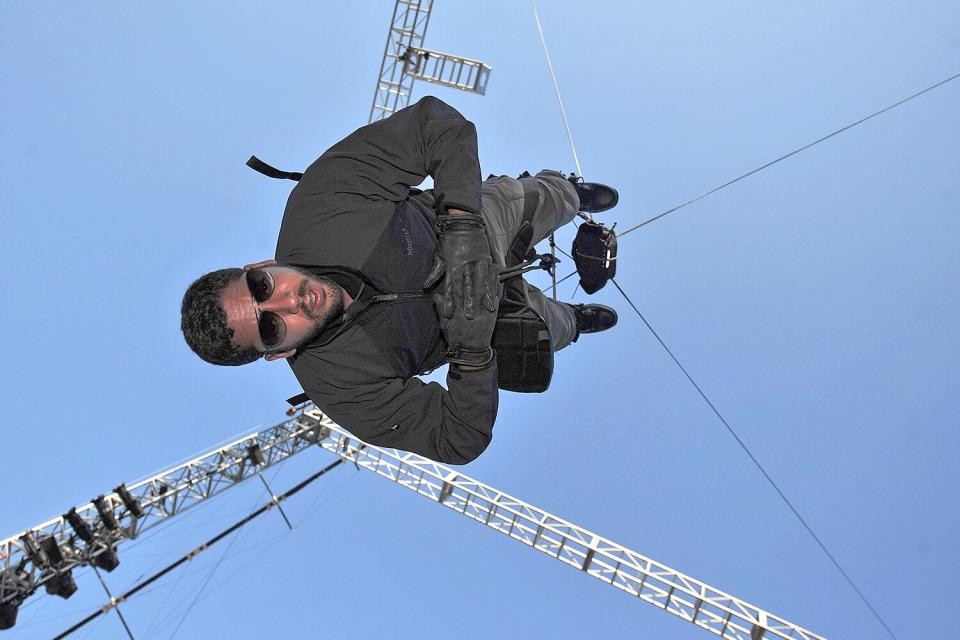 Illusionist David Blaine performs during 'The Upside Down Man' endurance challenge at Wollman Rink in Central Park on September 23, 2008 in New York City. The 35-year-old Blaine planned to hang for 60 hours from a wire, completing the stunt on September 24.