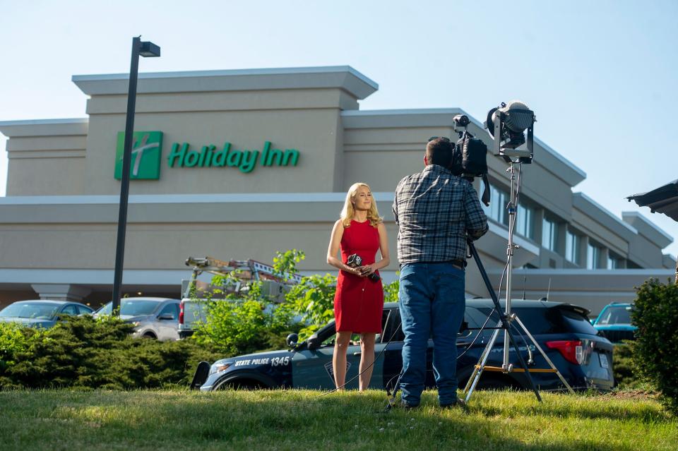NECN news reporter Kirsten Glavin is on air outside the Holiday Inn on Lakeside Avenue in Marlborough, June 1, 2023.