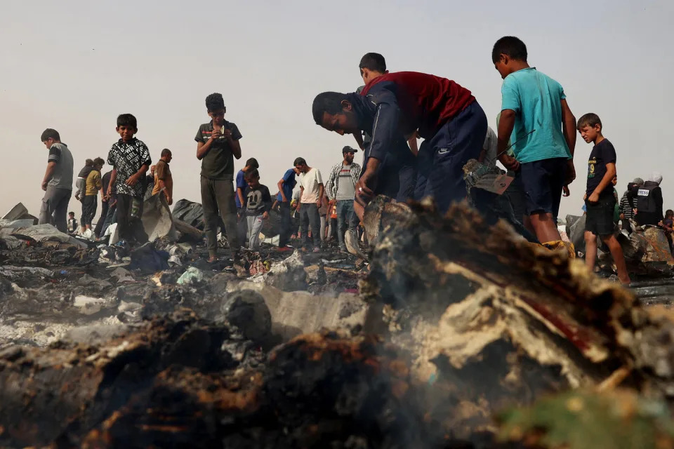 The Palestinian Authority and the militant group Hamas said Israeli strikes on a centre for displaced people killed dozens near the southern city of Rafah on May 26, while the Israeli army said it had targeted Hamas militants. (Eyad Baba / AFP - Getty Images)