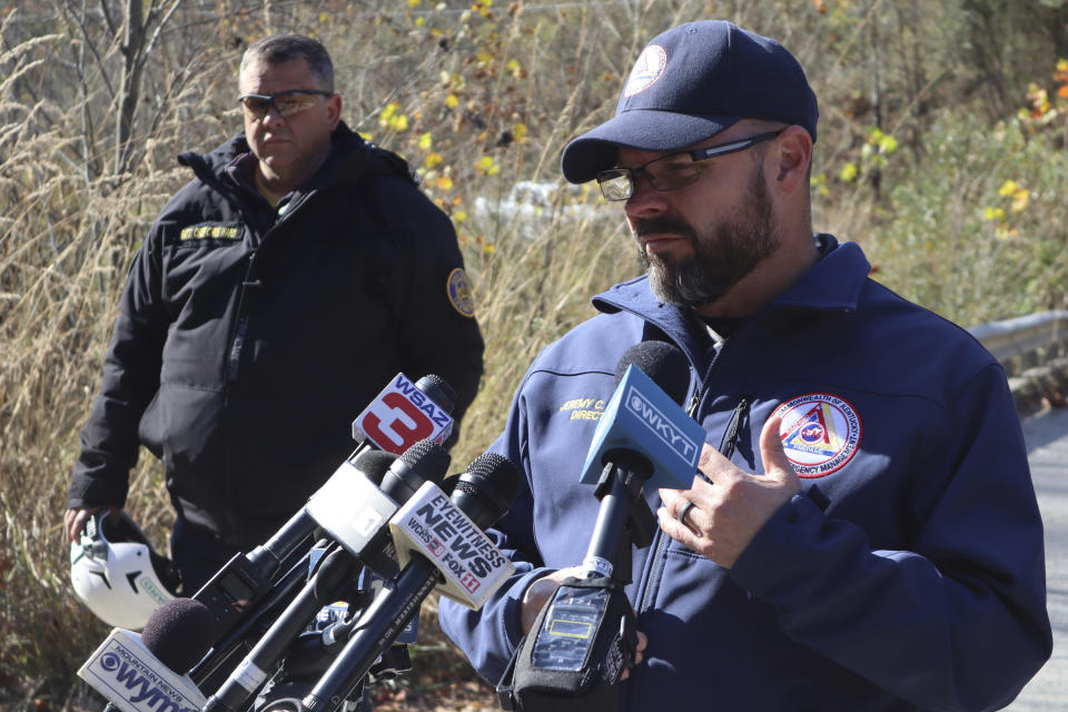 Director of Kentucky Emergency Management Col. Jeremy Slinker addresses reporters outside a road leading to the abandoned Martin Mine Prep Plant in Inez, K.Y. where the collapse of an 11-story tipple killed at least one man on Wednesday, Nov. 1, 2023. (AP Photo/Leah Willingham)