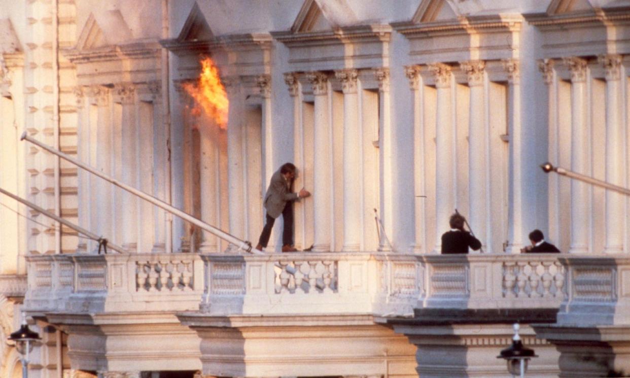 <span>A hostage is freed from the Iranian embassy watched by armed police.</span><span>Photograph: F Zabci/Rex Features</span>