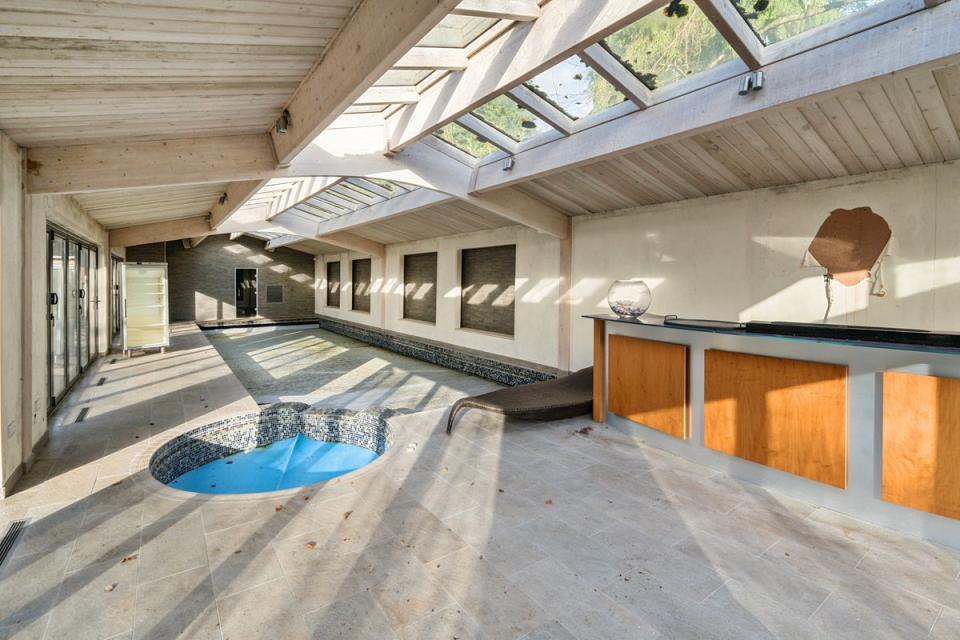 The mansion also has a separate building with an indoor swimming pool (Landwood Property Auctions)