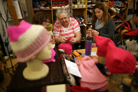 Knitters take part in the Pussyhat social media campaign to provide pink hats for protesters in the women's march in Washington, D.C., the day after the presidential inauguration, in Los Angeles, California, U.S., January 13, 2017. REUTERS/Lucy Nicholson