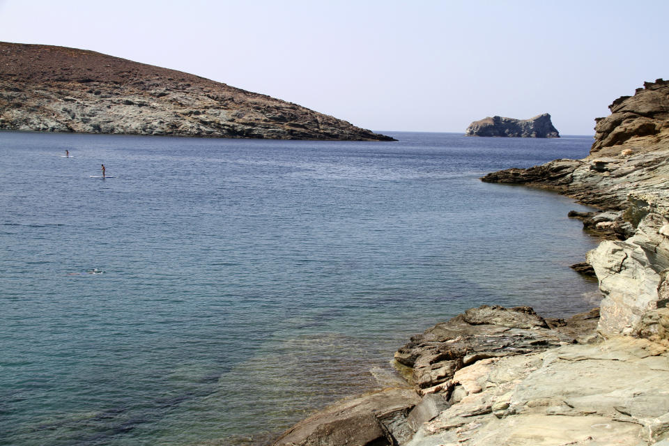 Paddleboarders enjoy the sparkling Aegean Sea off Kolimbithra beach in the island of Tinos, Greece, on Aug.27, 2021. As travel restrictions have eased since the peak of the pandemic, the Greek islands’ wide-open blue beckons. (AP Photo/Giovanna Dell’Orto)