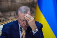 Turkish President Recep Tayyip Erdogan listens to a question during a joint news conference with Ukrainian President Volodymyr Zelenskyy following their meeting at Dolmabahce palace in Istanbul, Turkey, Friday, March 8, 2024. (AP Photo/Francisco Seco)