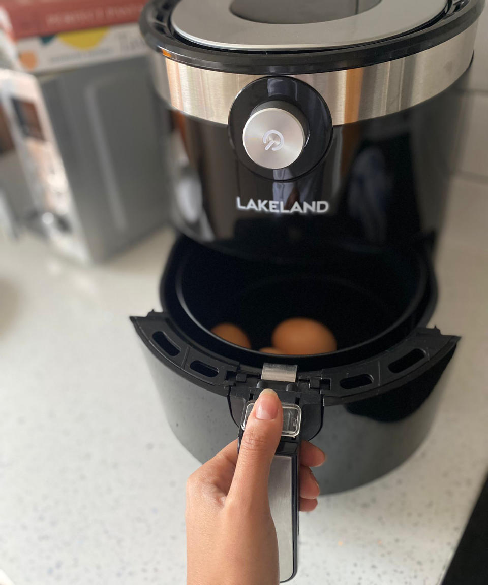 Three hard boiled eggs cooked in an air fryer