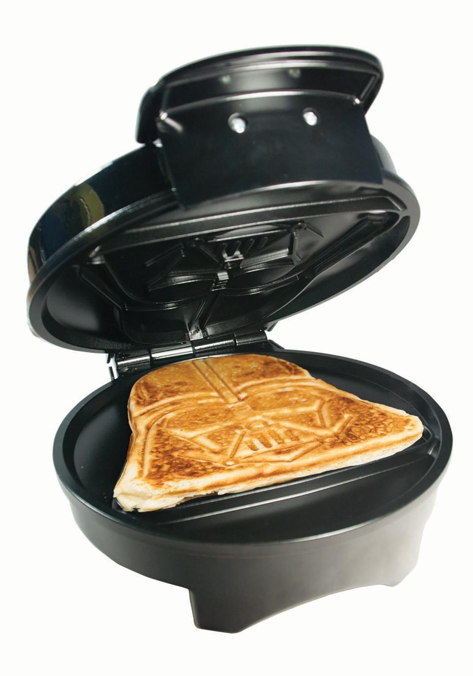 Does Dad like his waffles on the dark side? Then this <a href="http://www.fun.com/darth-vader-waffle-maker.html" target="_blank">Darth Vader waffle maker</a> is a force to be reckoned with.  