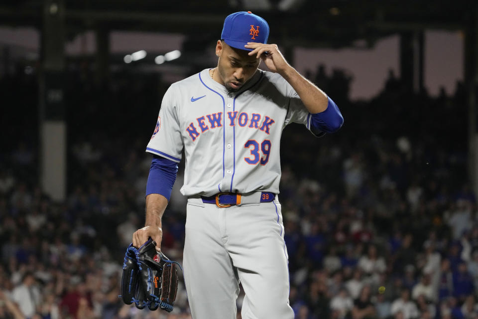 New York Mets relief pitcher Edwin Díaz reacts after being ejected by their base umpire Vic Carapazza during the ninth inning of a baseball game against the Chicago Cubs in Chicago, Sunday, June 23, 2024. (AP Photo/Nam Y. Huh)