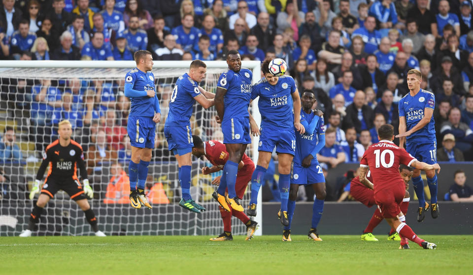 Philippe Coutinho scores a free-kick during the Premier League match between Leicester City and Liverpool at The King Power Stadium on September 23, 2017 in Leicester, England.