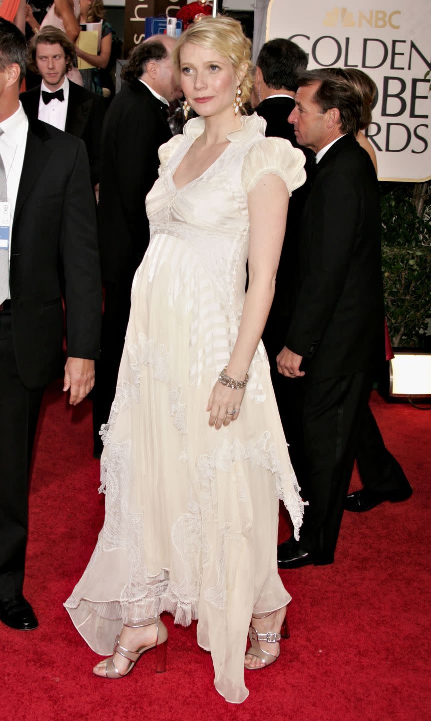 <p>Gwyneth Paltrow didn't let a growing bump stop her from sporting couture on the Golden Globes red carpet.</p>