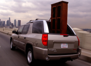 <p>At first glance, the Envoy XUV might look like any other mid-2000s SUV. But get to the back and you'll discover a surprisingly useful feature: The roof over the trunk section can retract into the car, creating an opening for larger items that might not otherwise fit. It might look a bit awkward, but it works. <a href="https://www.ebay.com/itm/2005-GMC-Envoy-XUV-XUV/143624146349?hash=item2170aa8dad:g:tBYAAOSwMPxe2X0K" rel="nofollow noopener" target="_blank" data-ylk="slk:This one's;elm:context_link;itc:0;sec:content-canvas" class="link ">This one's</a> up for grabs on eBay now. </p>