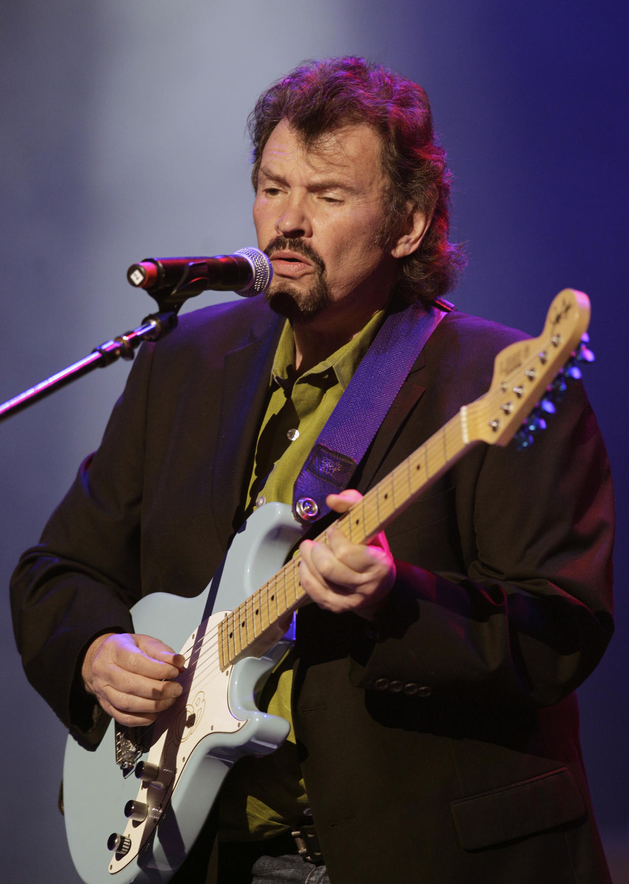 FILE - Jeff Cook of Alabama performs during the All for the Hall concert, benefitting the Country Music Hall of Fame and Museum, in Nashville, Tenn., on April 10, 2012. Cook died Nov. 7, 2022 at his home in Destin, Fla. He was 73. (AP Photo/Mark Humphrey, File)