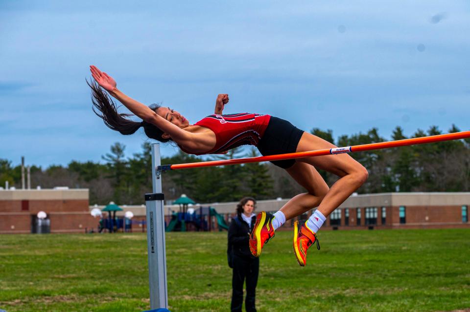 Old Rochester's Maggie Brogioli clears the five foot bar.