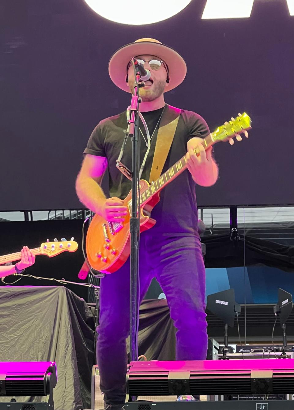 A member of King Calaway performs on Saturday night as the opening act for the Zac Brown Band at the Concert for Legends at Tom Benson Hall of Fame Stadium.