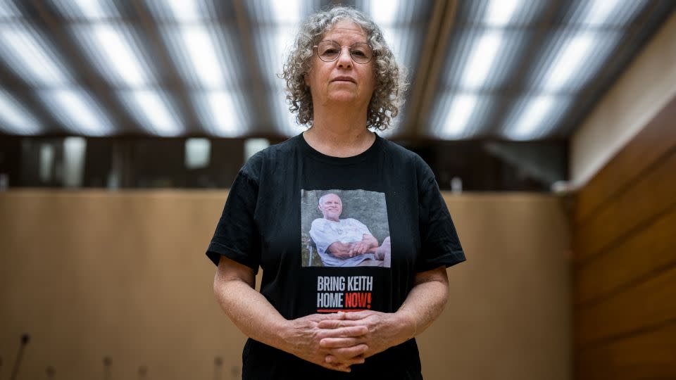 Former Hamas hostage Aviva Siegel wears a T-shirt showing a her husband Keith during her visit to the UN Human Rights Council in Geneva on February 28, 2024. Aviva Siegel was released on November 26, 2023. - Fabrice Coffrini/AFP/Getty Images