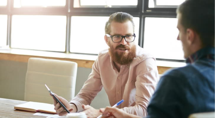 Financial advisor explaining someone's retirement social security tax obligation