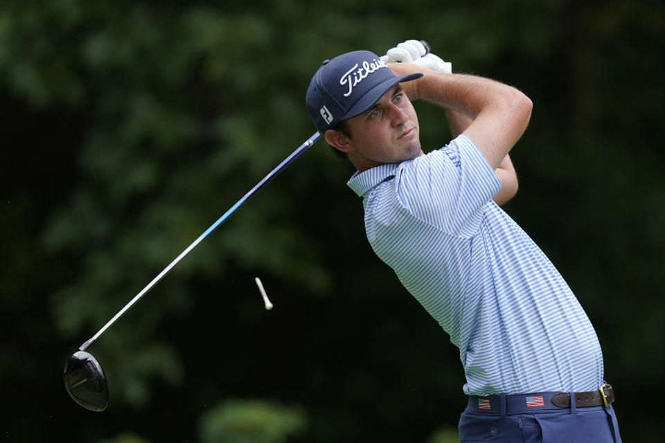 J.T. Poston hits off the second tee during the third round of the John Deere Classic golf tournament, Saturday, July 2, 2022, at TPC Deere Run in Silvis, Ill. (AP Photo/Charlie Neibergall)