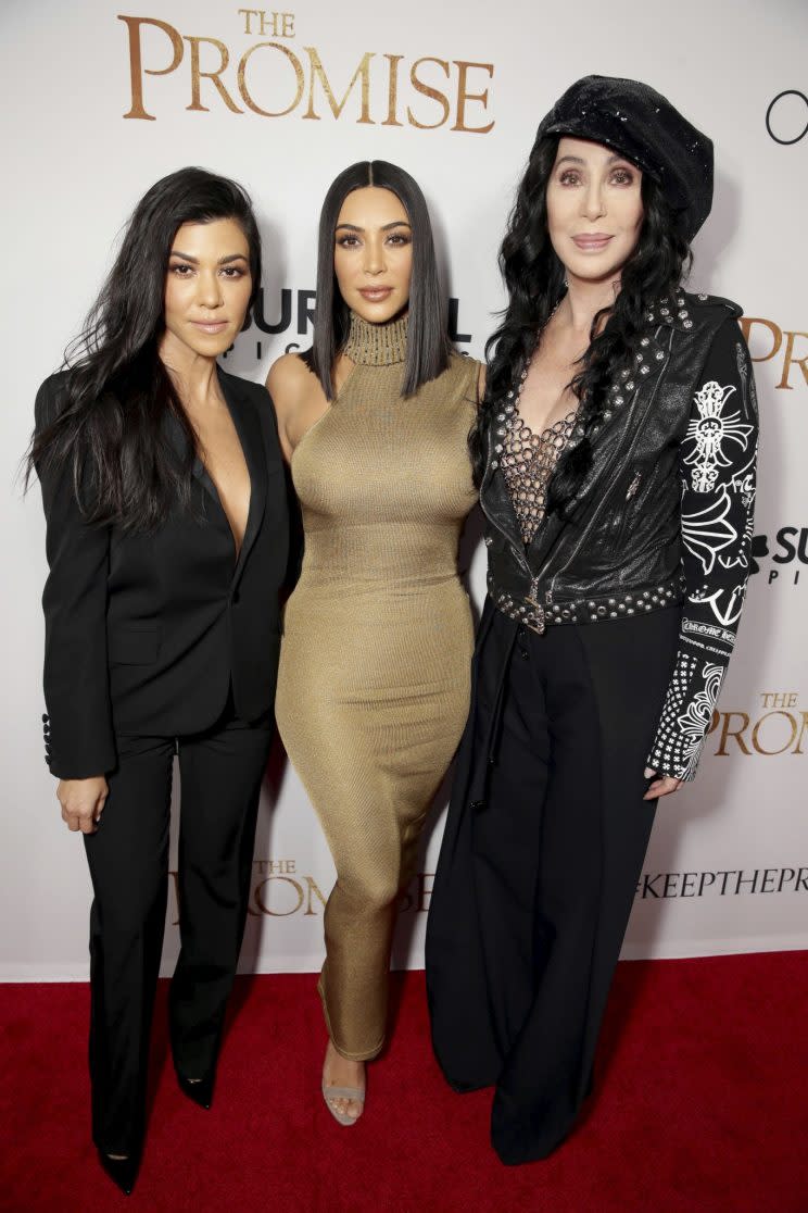 <i>The Kardashian sisters posed alongside Cher [Photo: AP]</i>