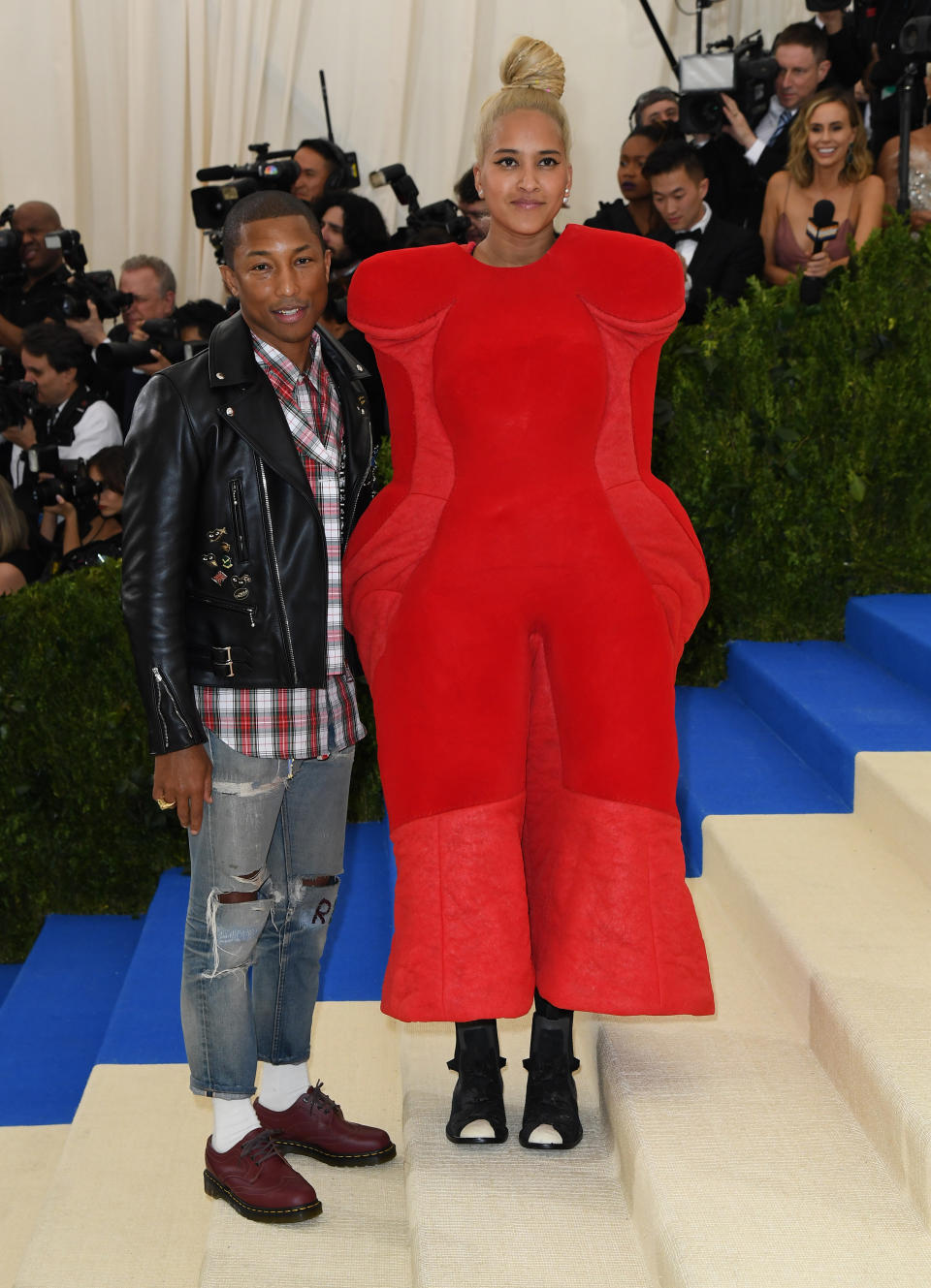 Pharrell Williams (L) and Helen Lasichanh in Comme des Gar&ccedil;ons&nbsp;