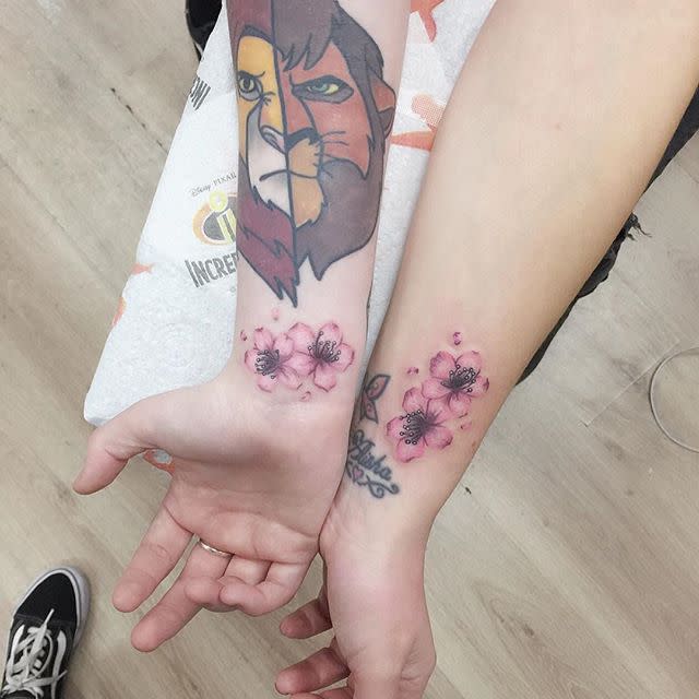 12) This Mother-Daughter Floral Tattoo