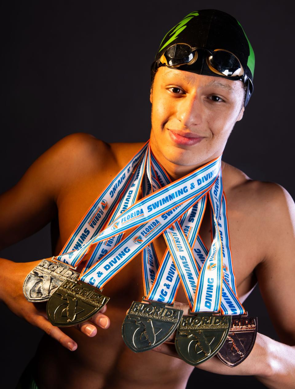 Eastside Ram swimmer Liam Aleman is this years Gainesville Sun Boys All Area Swimmer of the year. Aleman, a senior, was photographed at the Gainesville Sun studio Tuesday January 9, 2024. He took three gold, one silver and one bronze medals in the FHSAA 2023 Swimming & Diving State Championships in Class 2A. He took gold in the 200 IM, 100 Breast and 200 madly relay. He took silver for team and bronze for the 400 freestyle relay. [Doug Engle/Ocala Star Banner]2024