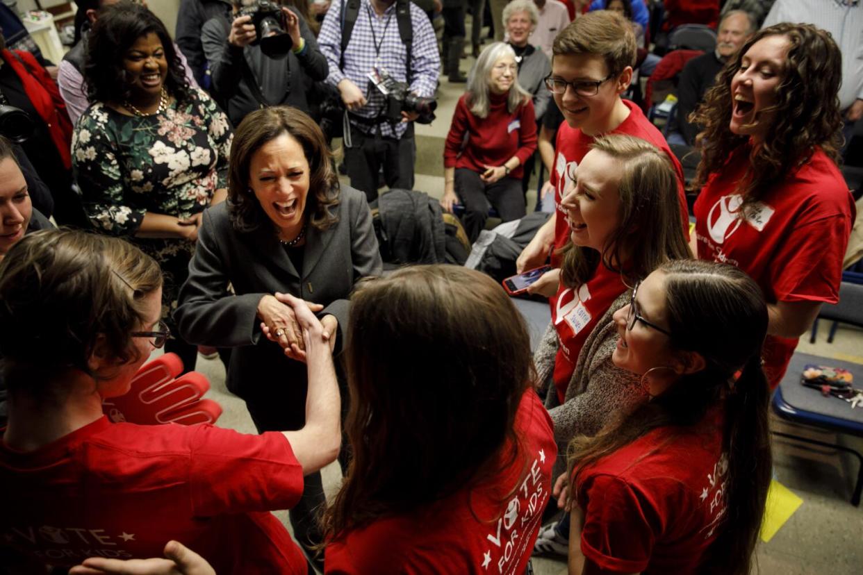 Sen. Kamala Harris greet supporters during her presidential bid in 2019.