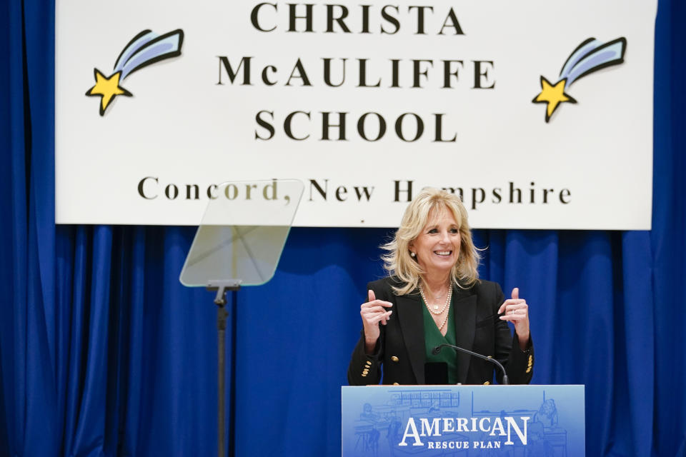 First lady Jill Biden speaks as she visits the Christa McAuliffe School in Concord, N.H., Wednesday, March 17, 2021, to pay tribute to the New Hampshire woman chosen 35 years ago to be America's "Teacher in Space" and to emphasize that the $1.9 trillion COVID-19 relief plan signed into law by President Joe Biden last week will provide funding for the reopening of schools. (AP Photo/Susan Walsh, Pool)