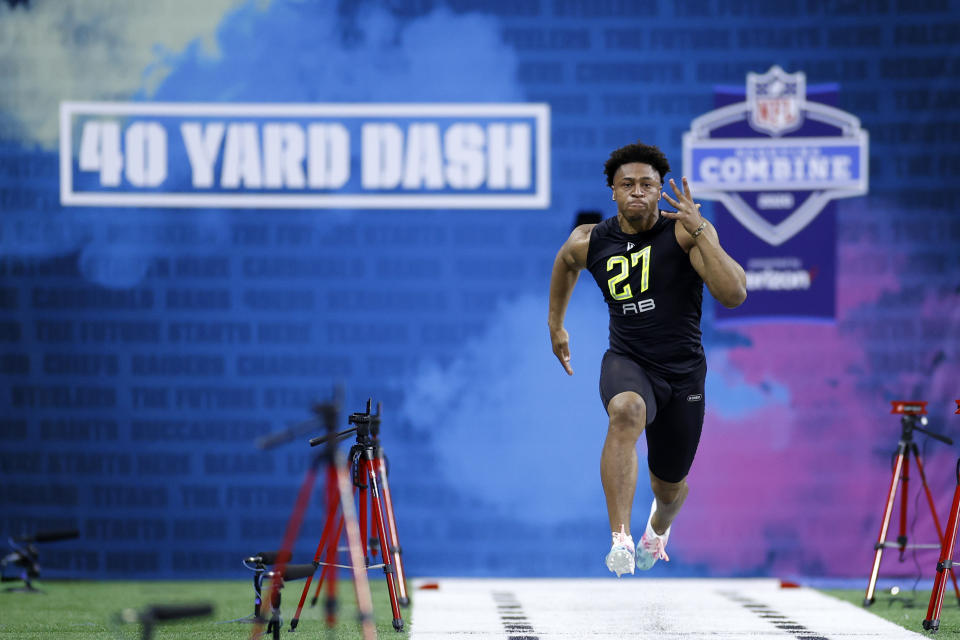 INDIANAPOLIS, IN - FEBRUARY 28: Running back Jonathan Taylor of Wisconsin runs the 40-yard dash during the NFL Combine at Lucas Oil Stadium on February 28, 2020 in Indianapolis, Indiana. (Photo by Joe Robbins/Getty Images)