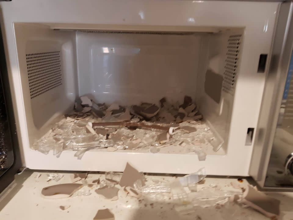 The plate and turntable inside the microwave had completely shattered. Source: Supplied.