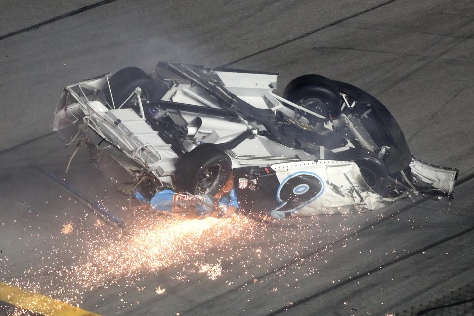 Ryan Newman slides down the track after he was involved in a crash on the final lap of the NASCAR Daytona 500 auto race at Daytona International Speedway, Monday, Feb. 17, 2020, in Daytona Beach, Fla. Sunday's race was postponed because of rain. (AP Photo/David Graham)