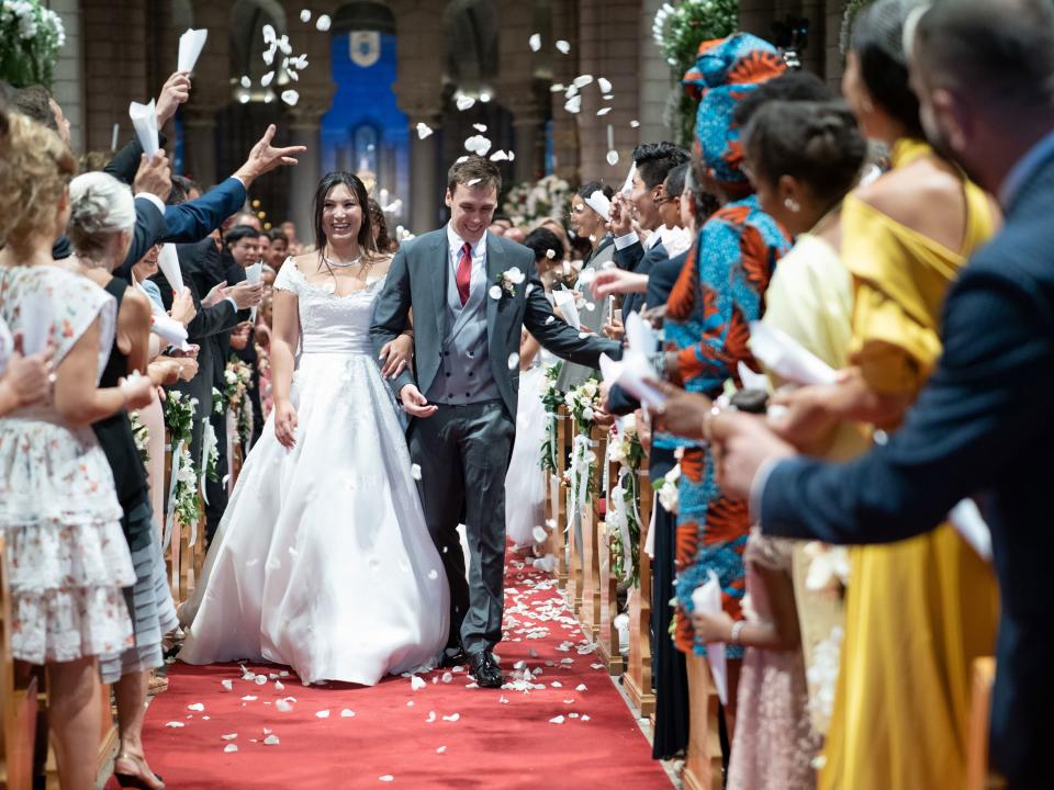 Marie Chevallier and Louis Ducruet leaving the Cathedrale surrounded by their family and close friends.