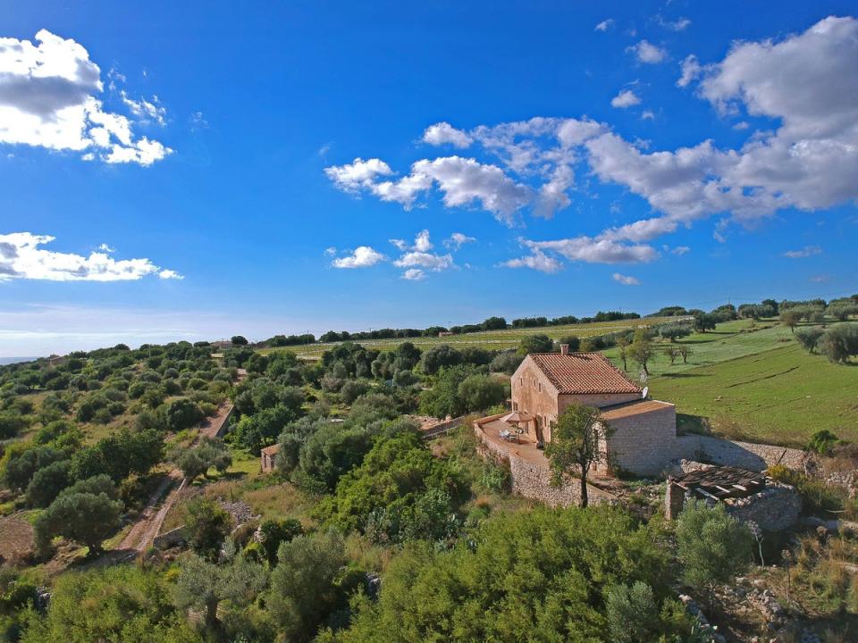 Villa Montablano is perched above a valley (The Luxury Travel Book)