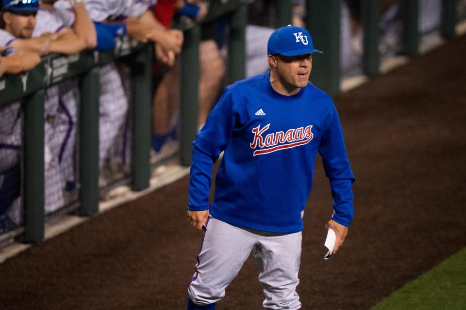 Kansas baseball coach Dan Fitzgerald exchanges words with officials during a game against Texas on May 16, 2024 at UFCU Disch-Falk Field in Austin.