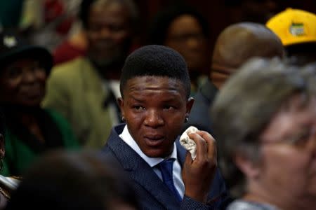 Victor Mlotshwa reacts after farmers Willem Oosthuizen and Theo Martins were sentenced for kidnap, assault and attempted murder, in connection with forcing Mlotshwa into a coffin, in Middelburg, South Africa, October 27, 2017. REUTERS/Siphiwe Sibeko