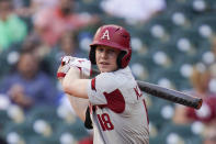 FILE - In this Feb. 28, 2020, file photo, Arkansas outfielder Heston Kjerstad (18) swings at a pitch during an NCAA baseball game against Oklahoma, in Houston. Kjerstad is expected to be an early selection in the Major League Baseball draft. (AP Photo/Matt Patterson, File)