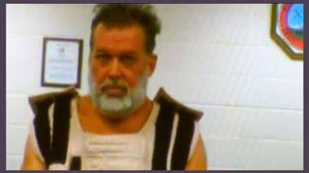 Accused Planned Parenthood gunman Robert Lewis Dear appears in court by video link from jail in Colorado Springs, Colorado in this November 30, 2015 still image from pool video. REUTERS/Pool