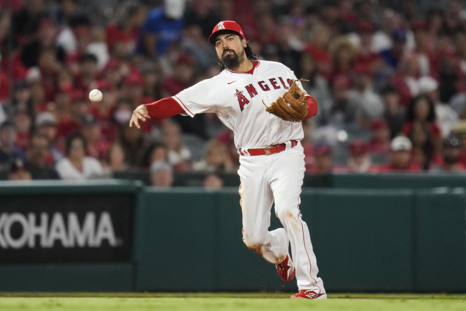 Los Angeles Angels third baseman Anthony Rendon (6) throws to first base to out Baltimore Orioles' Trey Mancini during the sixth inning of a baseball game Friday, July 2, 2021, in Anaheim, Calif. (AP Photo/Ashley Landis)