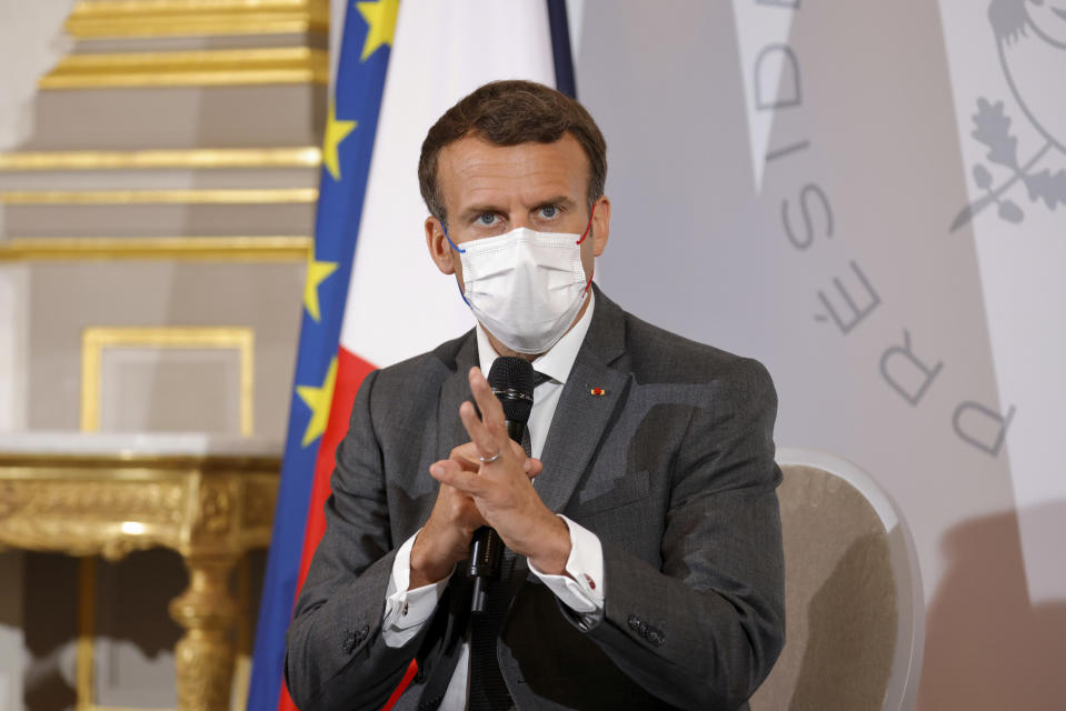 FILE - In this June 9, 2021, file photo, French President Emmanuel Macron attends a meeting with NGO representatives ahead of the G7 Summit, at the Elysee Palace in Paris. Helping countries recover from the coronavirus pandemic will be at the top of the agenda for the Group of Seven summit when British Prime Minister Boris Johnson welcomes President Joe Biden and the leaders of France, Germany, Italy, Japan and Canada to the cliff-ringed Carbis Bay beach resort in southwestern England on Friday, June 11. (Pascal Rossignol/Pool via AP, File)