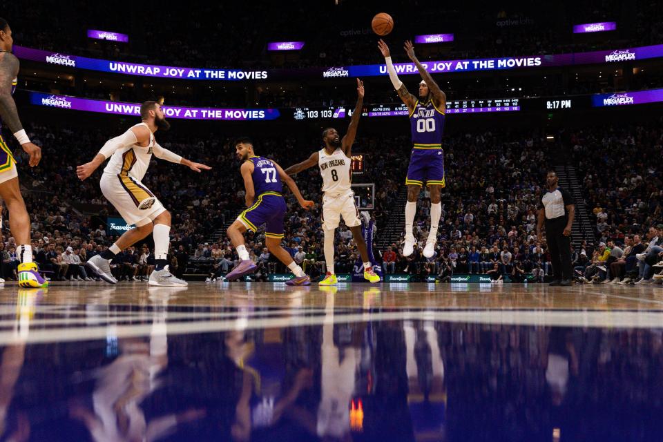 Utah Jazz guard Jordan Clarkson (00) shoots a 3-pointer during an NBA basketball game between the Utah Jazz and the New Orleans Pelicans at the Delta Center in Salt Lake City on Monday, Nov. 27, 2023. | Megan Nielsen, Deseret News