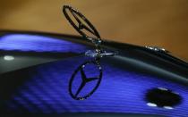 A car bonnet emblem of a Mercedes-Benz car is seen at the annual news conference of Daimler AG in Stuttgart February 5, 2015. REUTERS/Ralph Orlowski