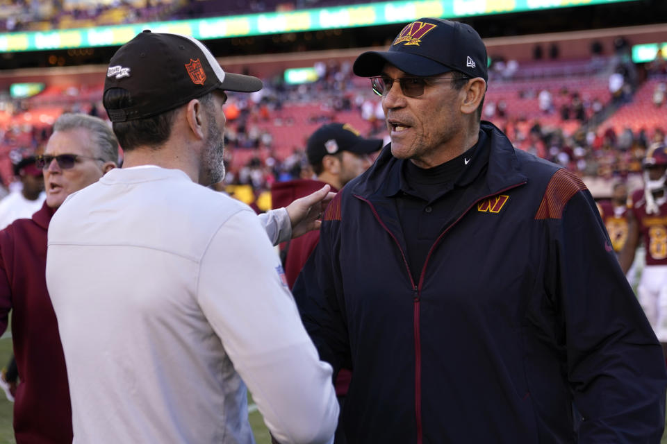 Washington Commanders head coach Ron Rivera, right, shakes hands with Cleveland Browns head coach Kevin Stefanski after a 24-10 loss, Sunday, Jan. 1, 2023, in Landover, Md. (AP Photo/Patrick Semansky)