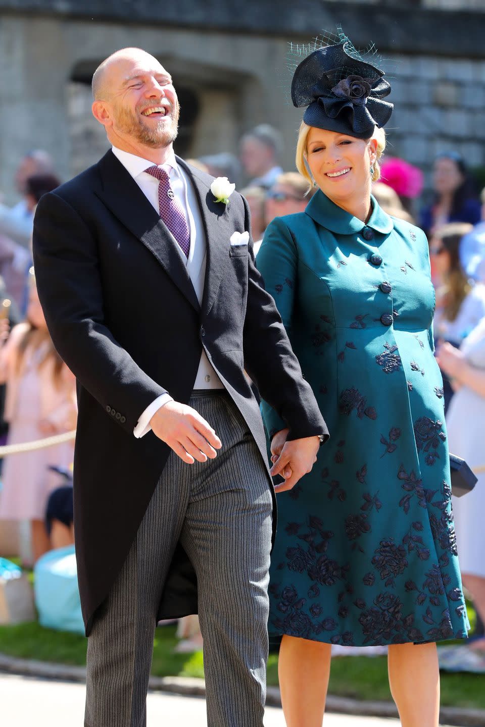 <p>Zara and Mike Tindall, expecting their second child together, enjoyed a laugh as they headed inside St George's Chapel at Windsor Castle <a href="https://www.townandcountrymag.com/society/tradition/g14522381/prince-harry-meghan-markle-royal-wedding-2018-photos/" rel="nofollow noopener" target="_blank" data-ylk="slk:for the wedding of Prince Harry and Meghan Markle.;elm:context_link;itc:0" class="link ">for the wedding of Prince Harry and Meghan Markle.</a></p>