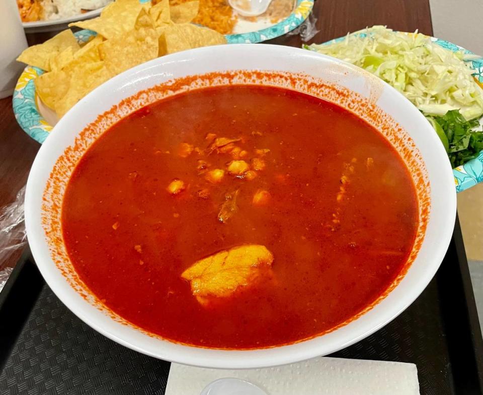 Los Nopales Carniceria & Taqueria serves pozole rojo with toothsome hominy and giant chunks of fatty pork.