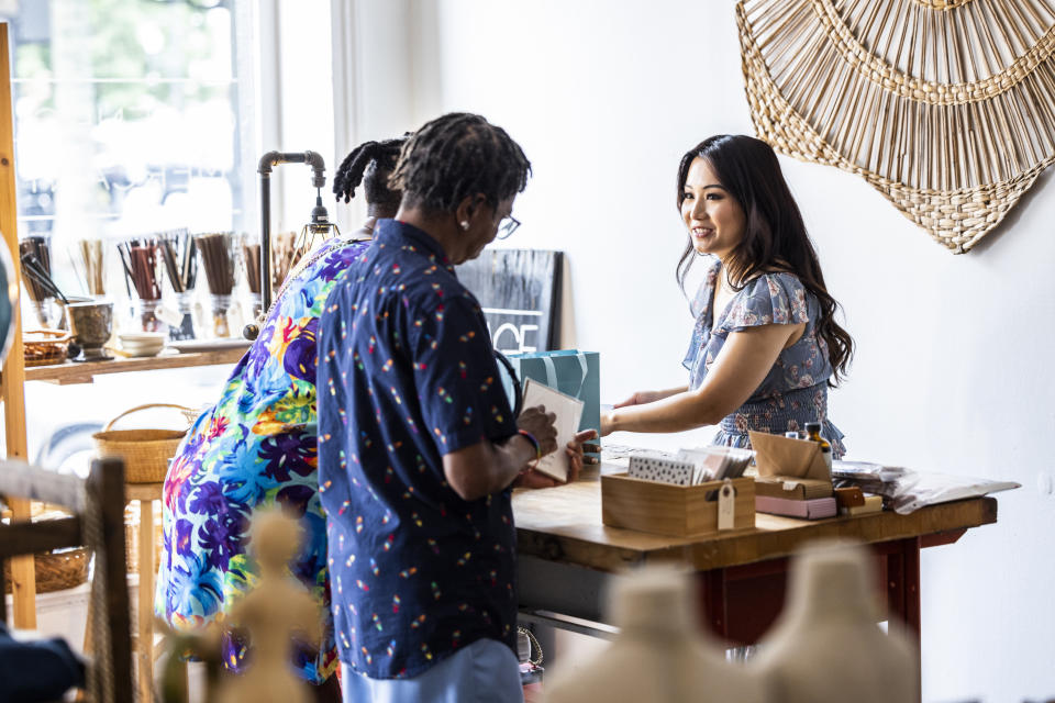 People checking out in a retail store